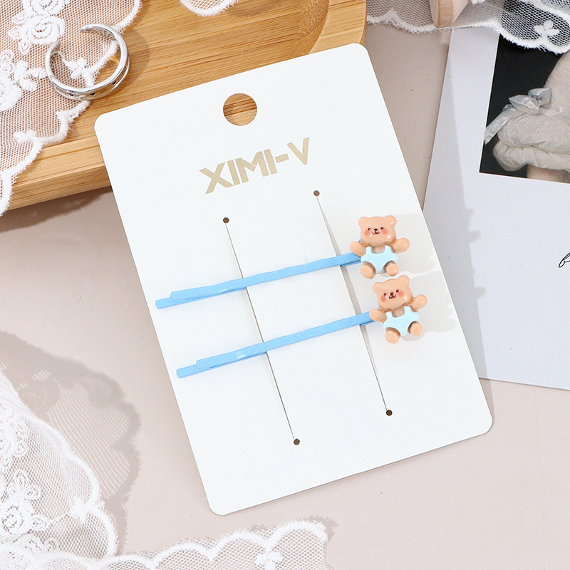 مشابك شعر دب بني صغير (أزرق)