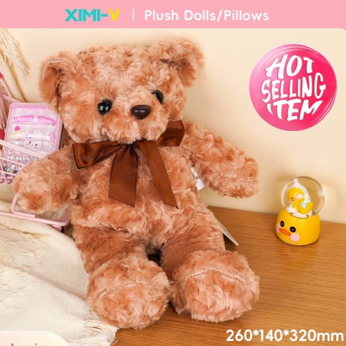 دمية دب مخملي بشرائط الورد حجم صغير ٣٢ سم لون بني