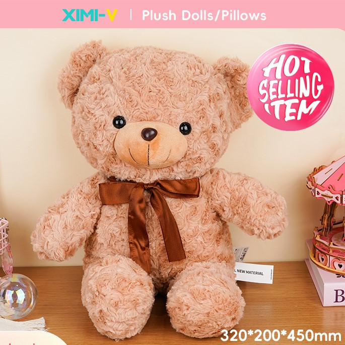 دمية دب مخملي بشرائط الورد لون بني