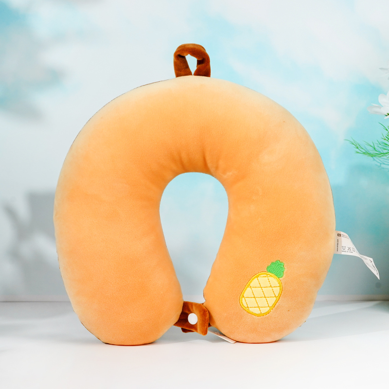 وسادة رغوية بلون موحد على شكل حرف U (وردي باهت)