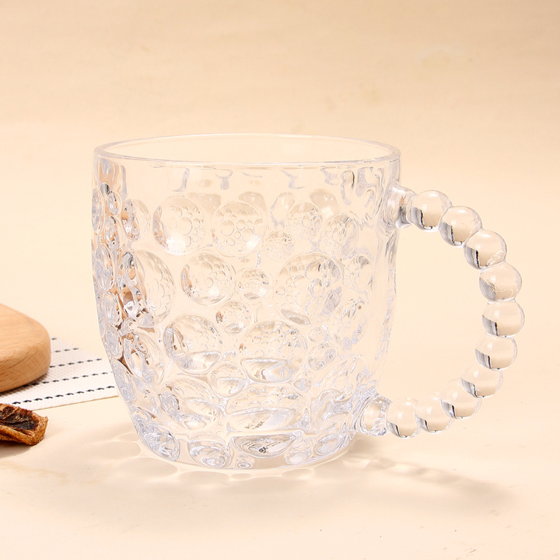كوب زجاجي بمقبض قرع (شفاف)