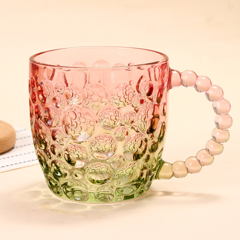 كوب زجاجي بمقبض قرع (متدرج أخضر)