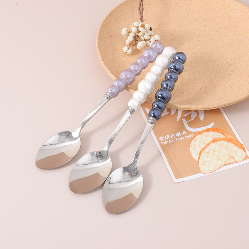 ملعقة طاولة إبداعية خزفية بتصميم اللؤلؤ