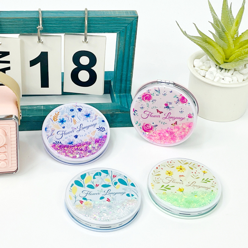 مرآة محمولة لامعة مستديرة بزخارف الزهور الفاخرة