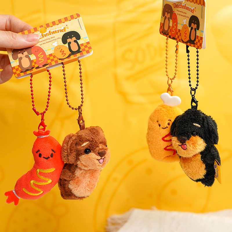 ميدالية دمية زوجين من كلاب الداشهند