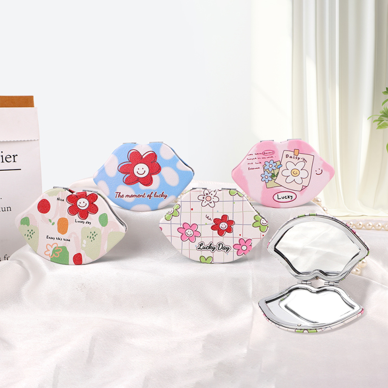 مرآة محمولة بشكل شفاه دوار الشمس أنيقة