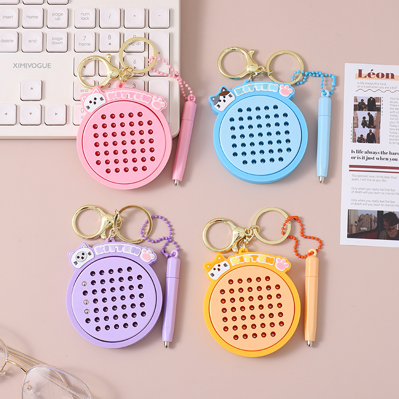 سلسلة مفاتيح تخفيف التوتر كرة فولاذية مغناطيسية قطة