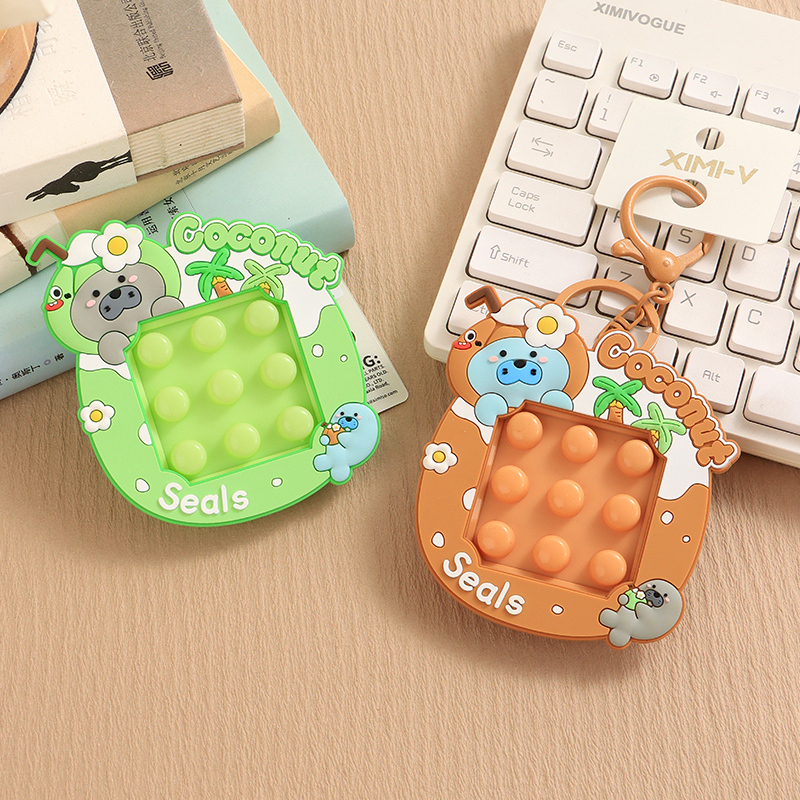 سلسلة مفاتيح تخفيف التوتر فقمة جوز الهند