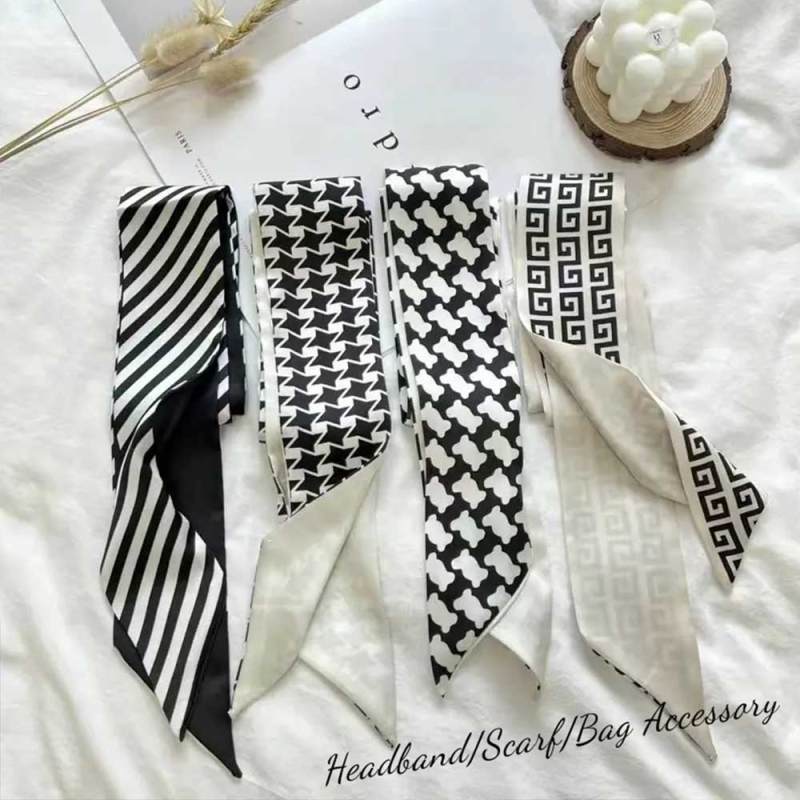 عصابة رأس بنمط أسود وأبيض بسيط