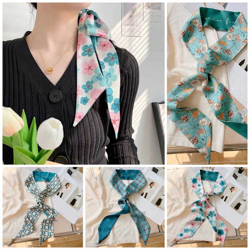 عصابة رأس بزهور زرقاء