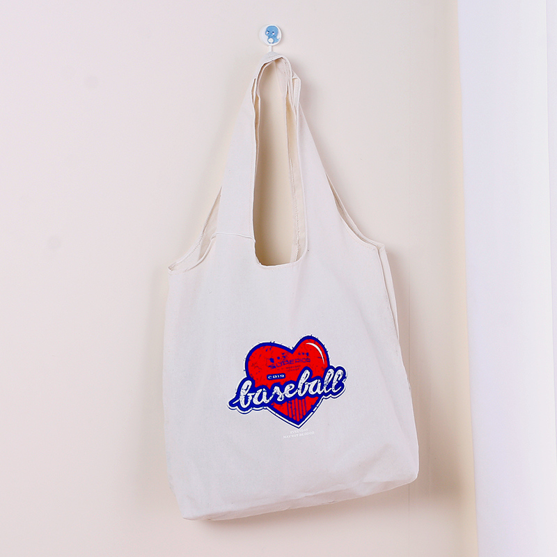 حقيبة كانفاس على شكل صدرية (قلب محب)