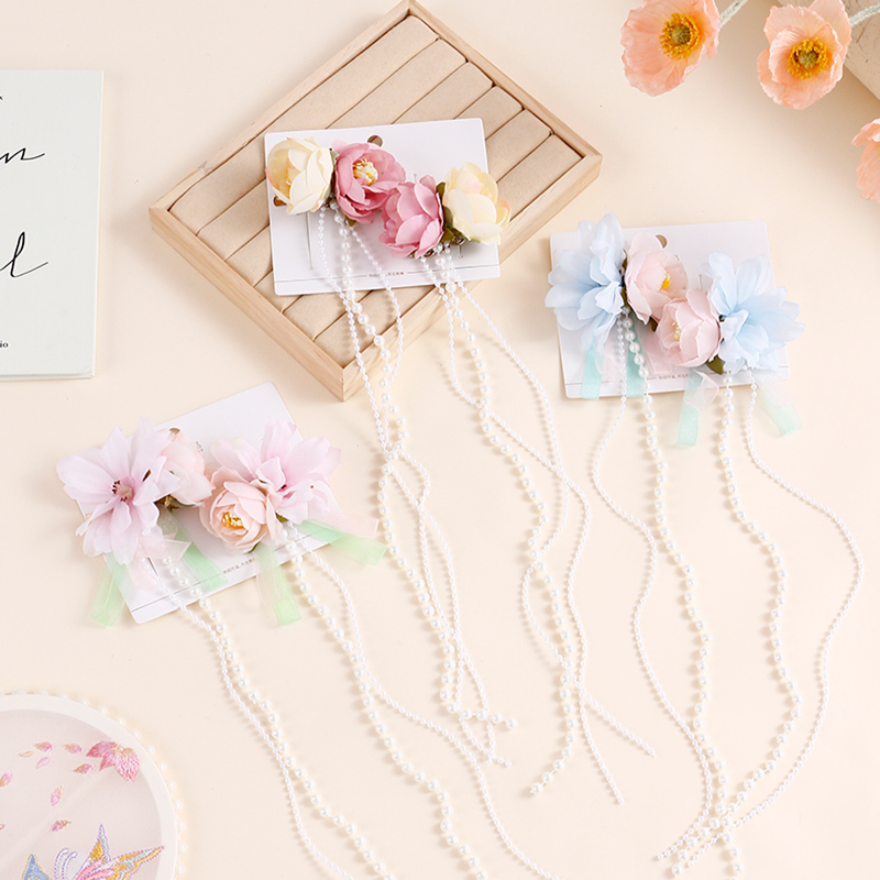 زوج مشابك شعر خرزية بشكل ماغنوليا